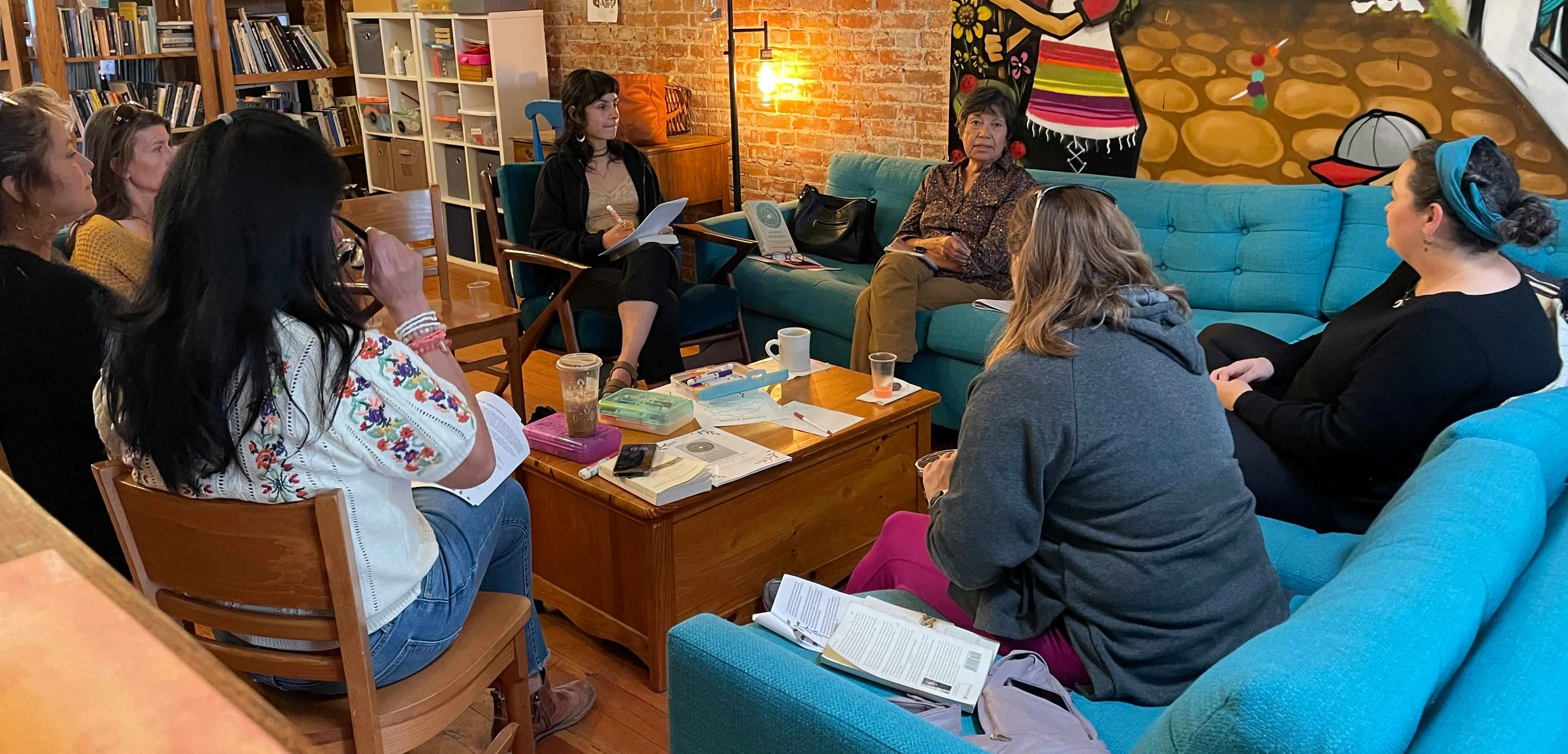 Two people volunteering and smiling
